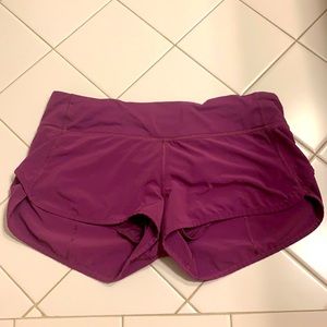 Purple Lululemon speed up shorts in 2.5 length